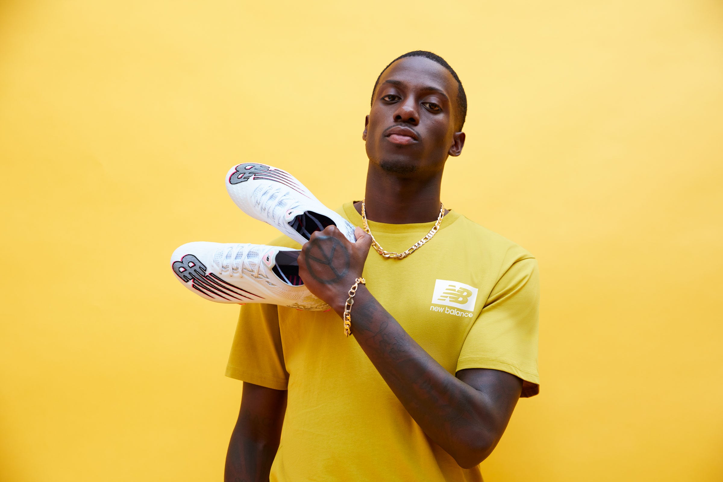 NEW BALANCE WELCOMES TIM WEAH