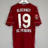 2009/10 FREIBURG GLOCKNER #19 *SQUAD SIGNED* HOME SHIRT (L) NIKE