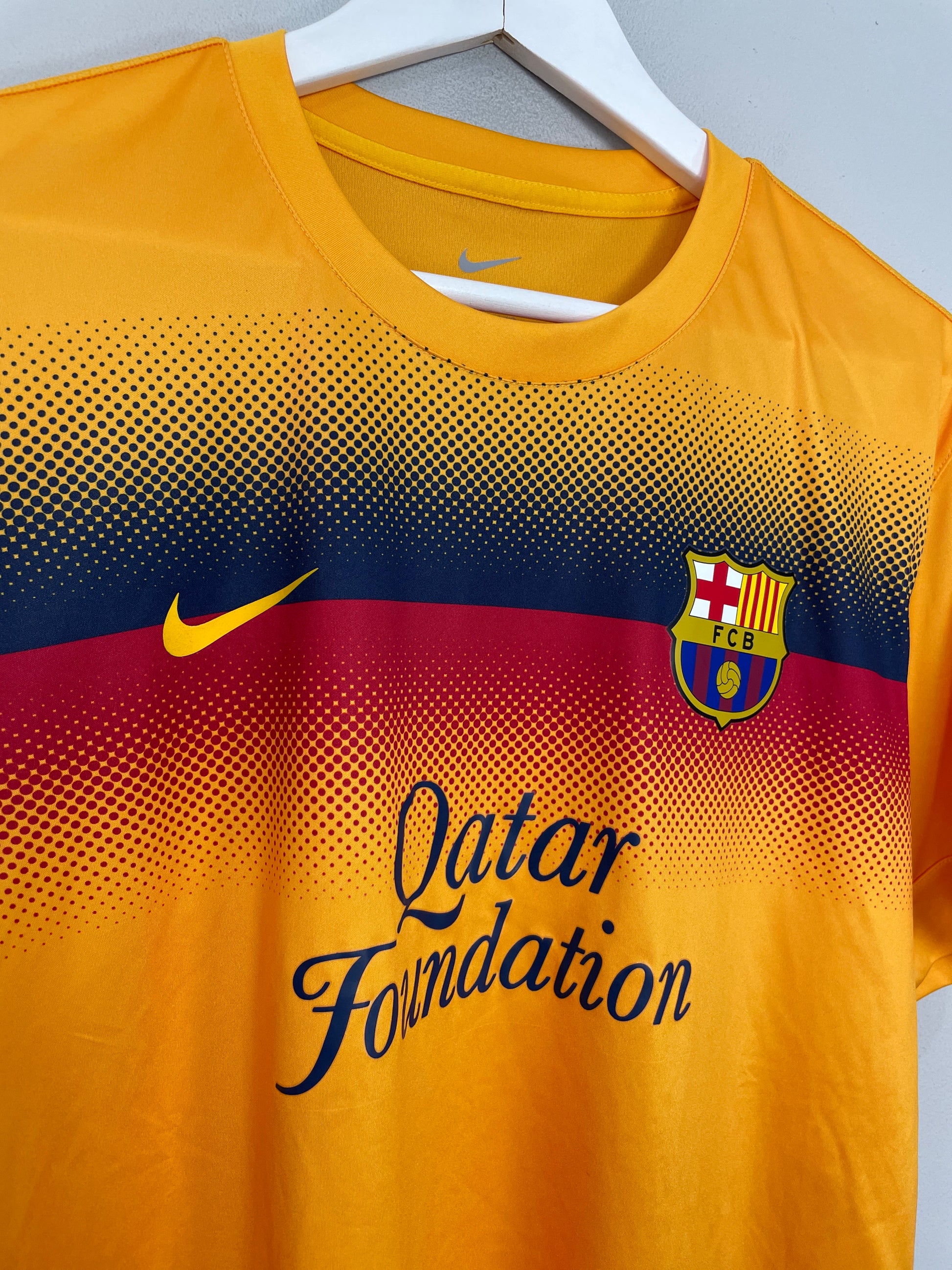 NIKE FC BARCELONA 21/22 PREMATCH JERSEY (ORANGE/BLUE)