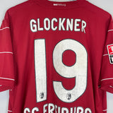 2009/10 FREIBURG GLOCKNER #19 *SQUAD SIGNED* HOME SHIRT (L) NIKE