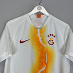 2018/19 Galatasaray third shirt by Nike in excellent condition, size medium, featuring unique orange design and team logo.