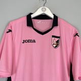 2014/15 Palermo home shirt by Joma in large size, featuring light wear to the badge, displayed on a hanger.