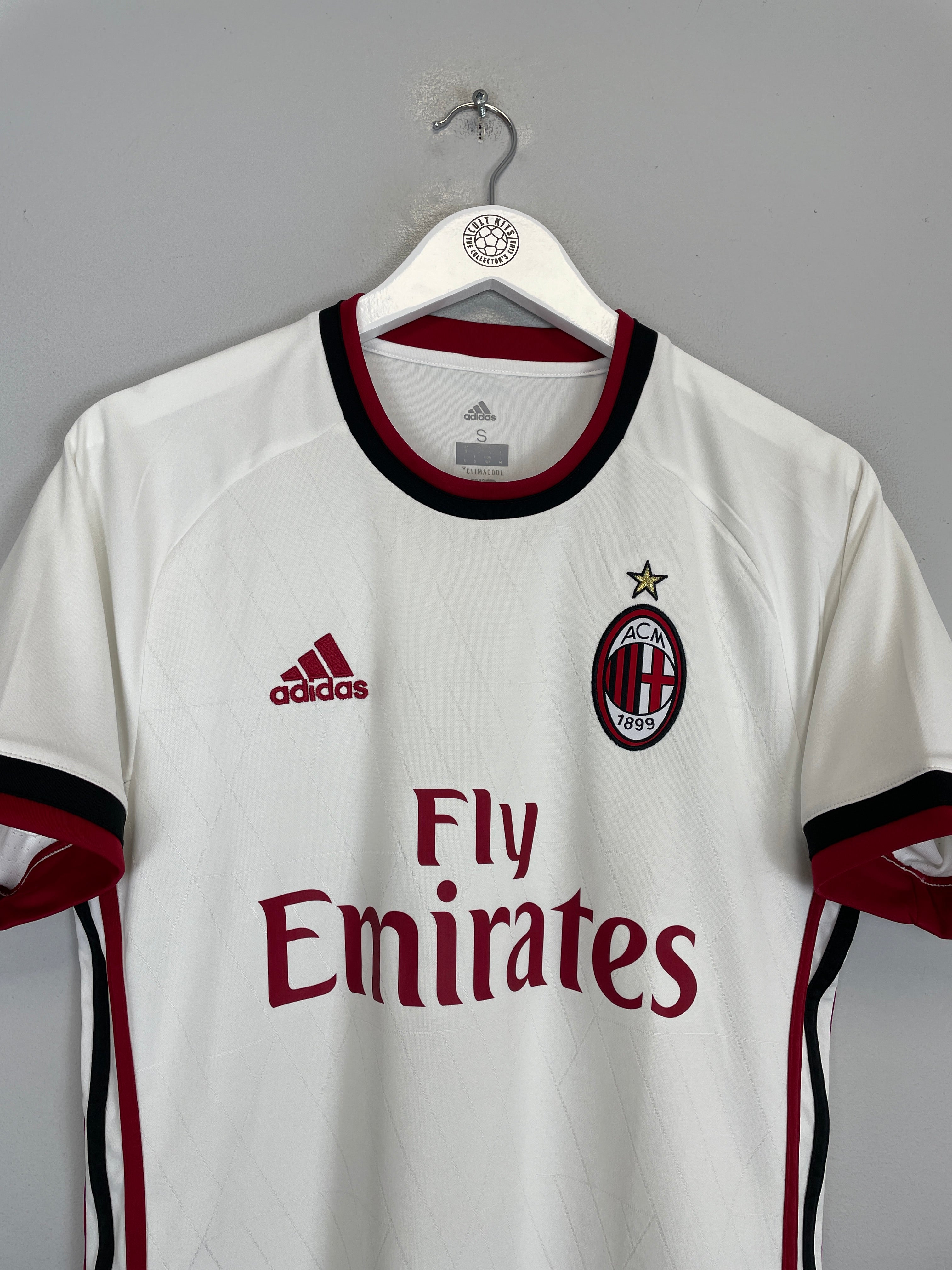 2017/18 AC Milan away shirt by Adidas in excellent condition, size small, featuring Fly Emirates logo and iconic team badge.