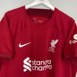 2022/23 Liverpool Thiago #6 home shirt in red by Nike, featuring LFC badge and Standard Chartered logo, size XL.