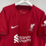 2022/23 Liverpool Thiago #6 home shirt in red by Nike, featuring LFC badge and Standard Chartered logo, size XL.