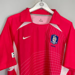 2002/04 South Korea home shirt size L by Nike in excellent condition, vibrant pink with logo and mesh design.