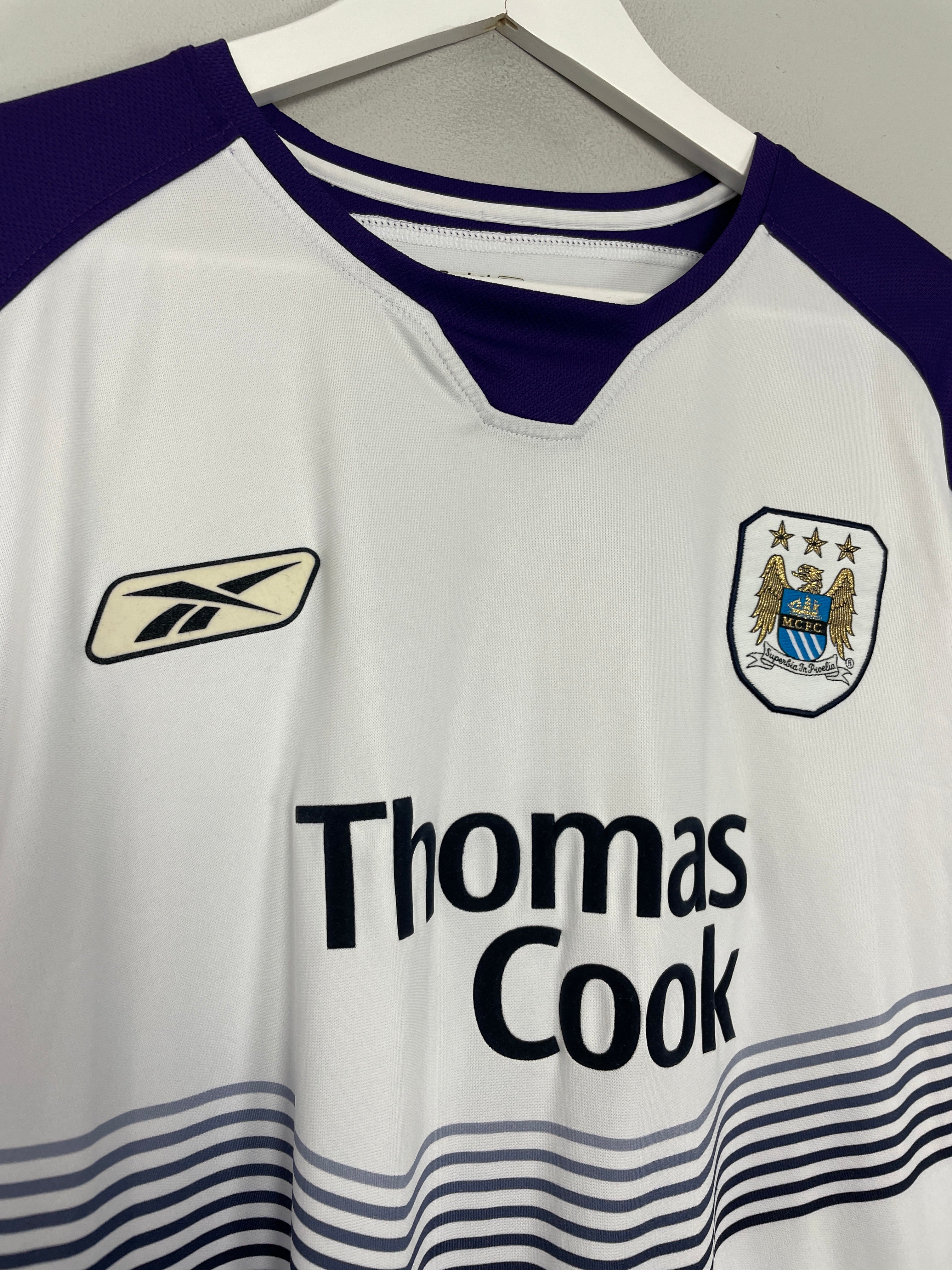 Man city reebok store kit