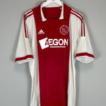 2011/12 Ajax home shirt size large by Adidas in excellent condition, featuring red and white design with AEGON logo.