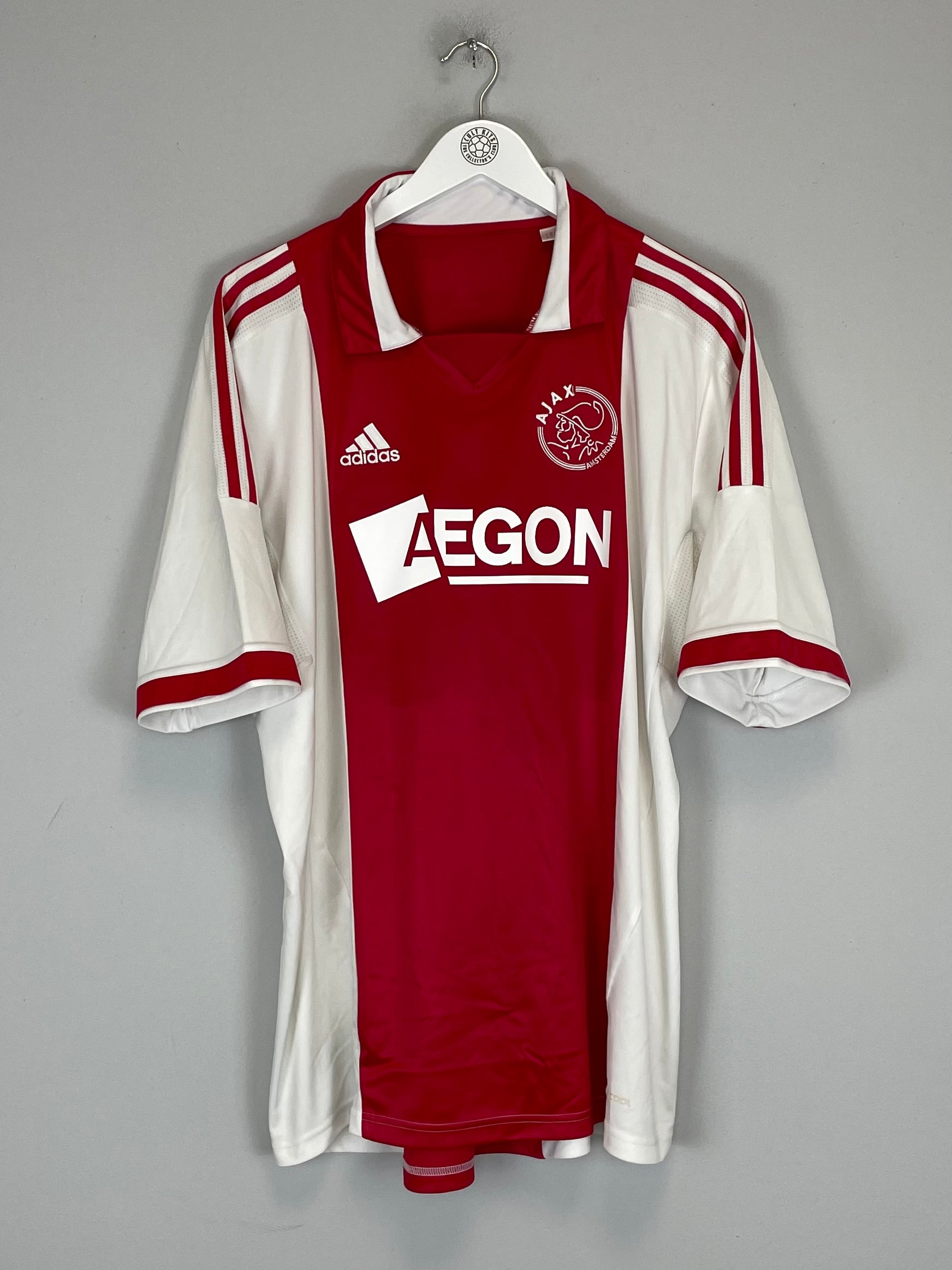 2011/12 Ajax home shirt size large by Adidas in excellent condition, featuring red and white design with AEGON logo.