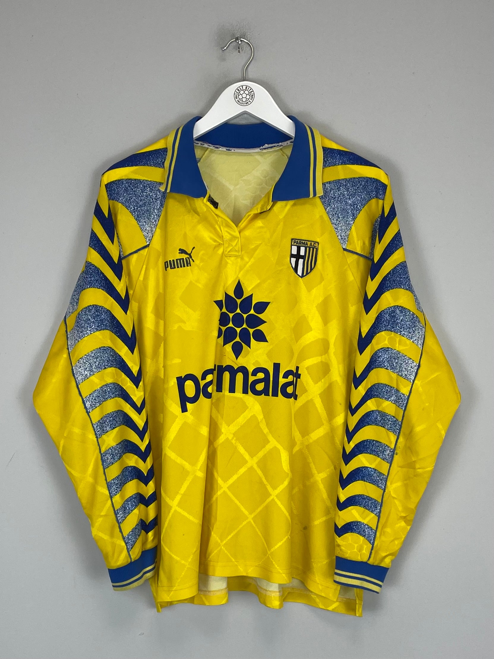 1995/97 Parma L/S home shirt in vibrant yellow, medium size by Puma, featuring unique design and minor pinholes.