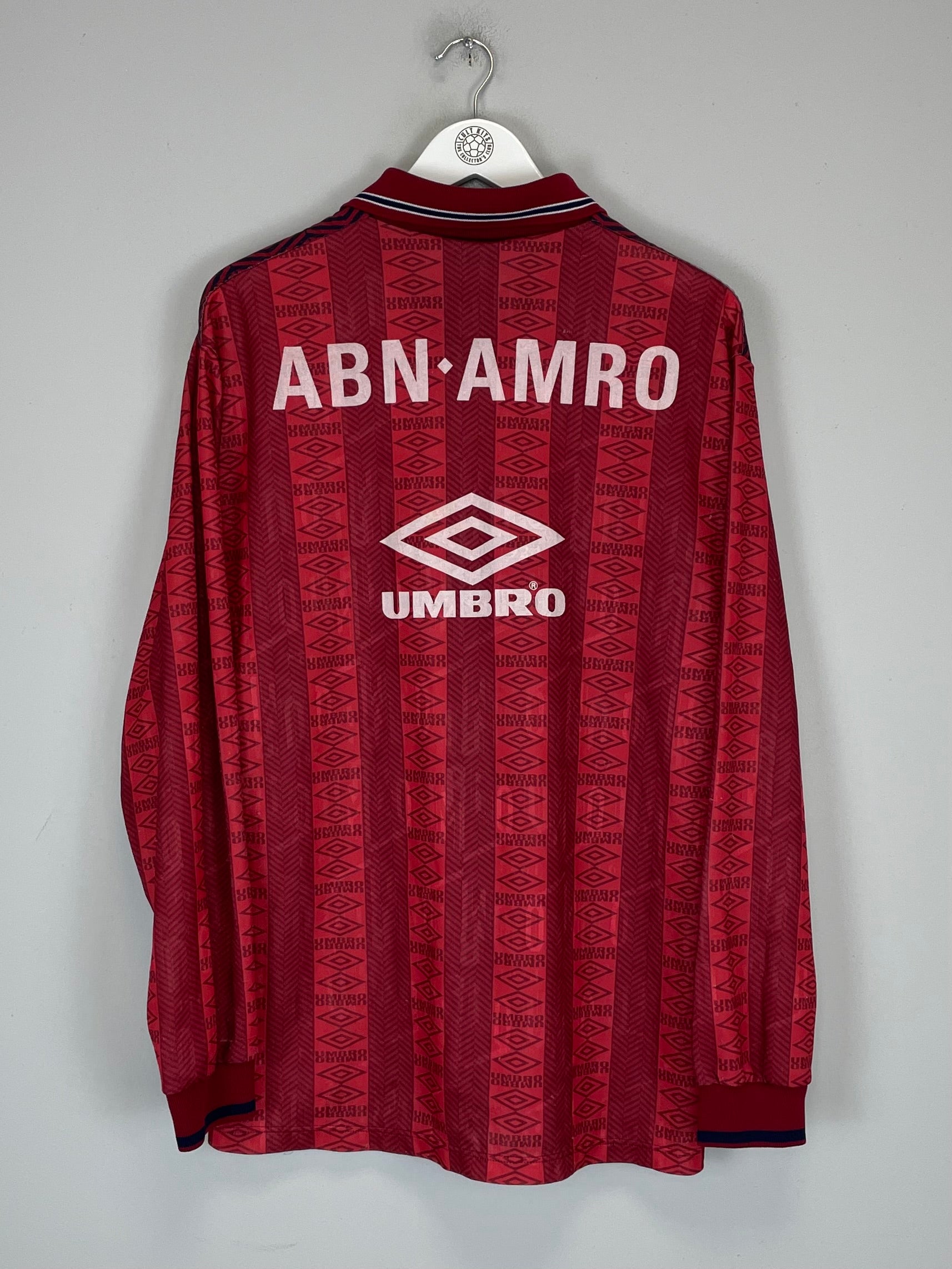 1994 Ajax training shirt by Umbro, XL, featuring ABN AMRO logo, in excellent condition, red patterned design.