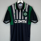 1994/95 Celtic away shirt in excellent condition, size medium, made by Umbro, featuring team logo and unique design.