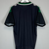 1994/95 Celtic Away Shirt back view in excellent condition, size Medium by Umbro, featuring black and green design.