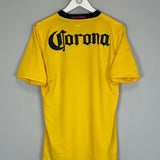 Back view of the 2008/09 Club America home shirt (M) by Nike featuring the Corona logo in yellow and black.