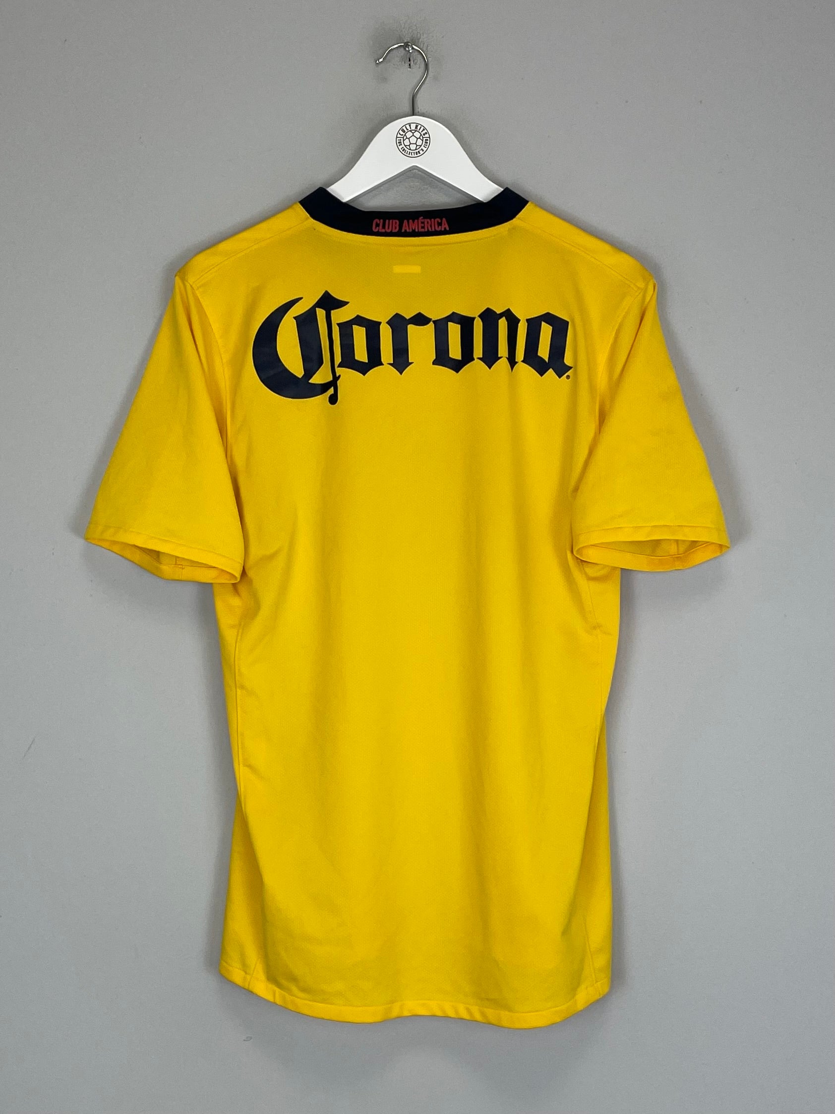 Back view of the 2008/09 Club America home shirt (M) by Nike featuring the Corona logo in yellow and black.