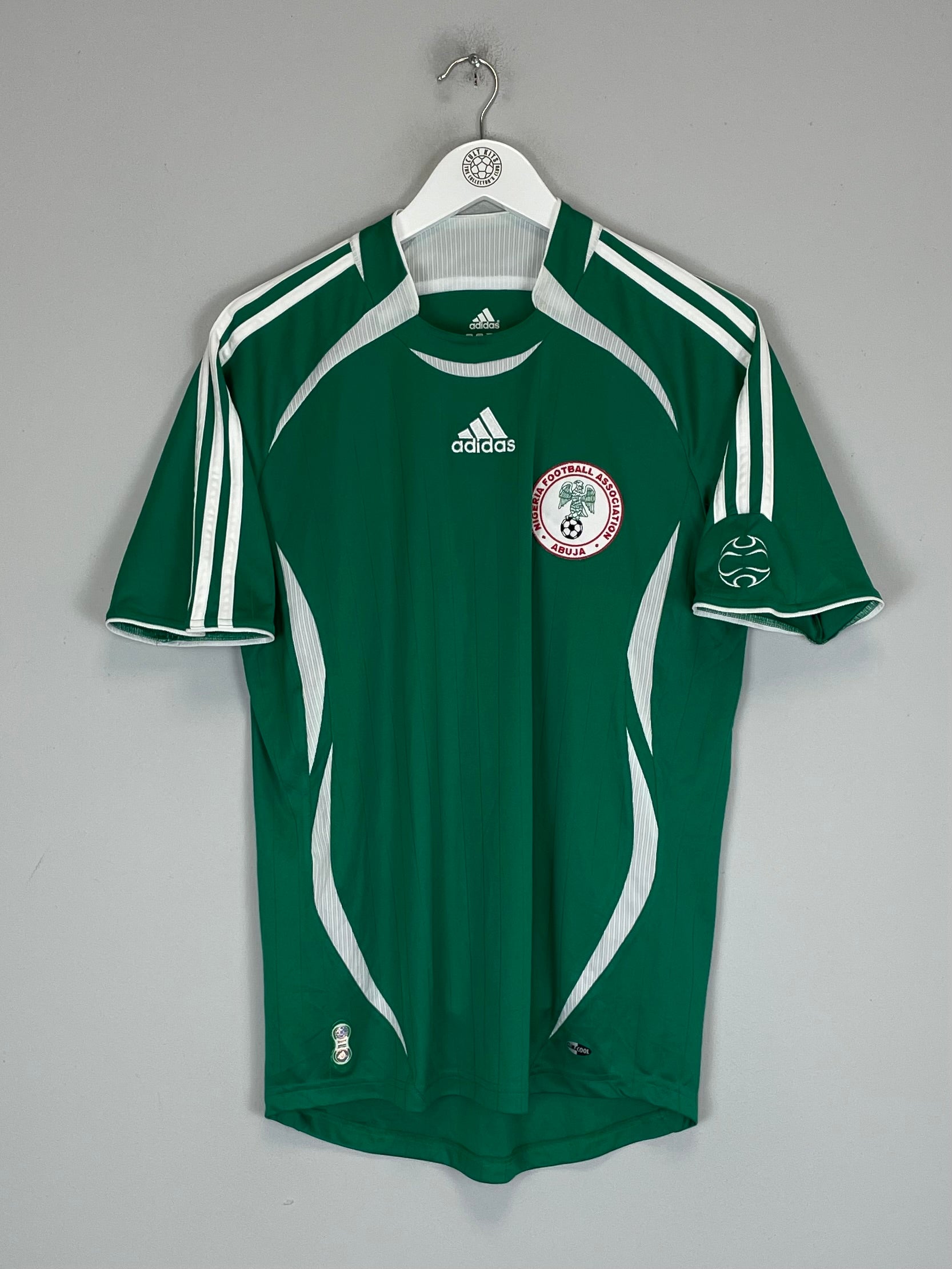 2006/07 Nigeria home shirt by Adidas in green, size small, excellent condition, featuring team logo and Adidas branding.