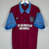 1995/97 West Ham Home Shirt by Pony, size large, excellent condition, featuring club badge and Dagenham Motors sponsor.