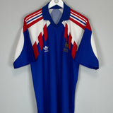 1990/92 France home shirt by Adidas in excellent condition, size large, featuring iconic blue and red design.