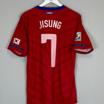 2010/12 SOUTH KOREA JI SUNG #7 HOME SHIRT (L) NIKE