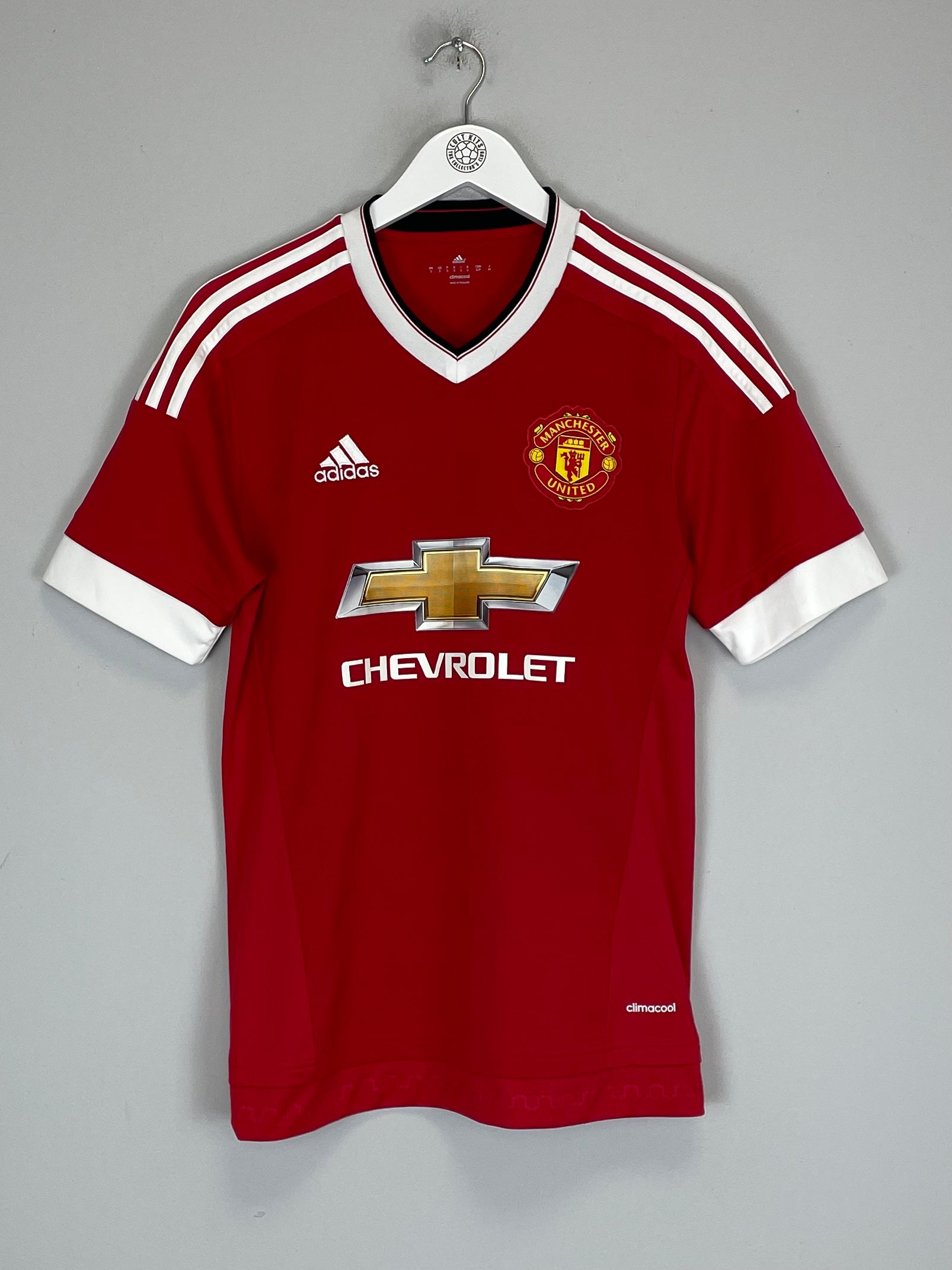 2015/16 Manchester United home shirt by Adidas in red, size small, featuring Chevrolet logo, excellent condition.