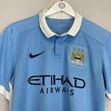 2015/16 MANCHESTER CITY KOMPANY #4 HOME SHIRT (M) NIKE